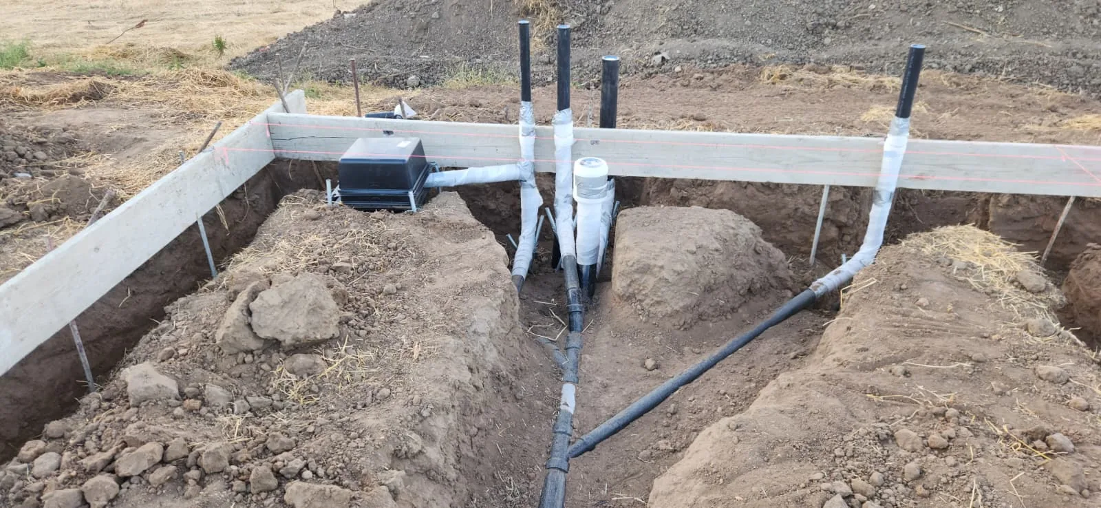 M & CA Plumbing team at work on a professional plumbing installation